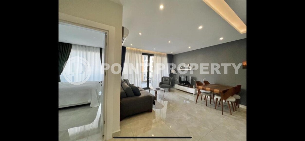 Квартира 1+1 площадью 60 м² на первой береговой линии в Махмутларе-id-10028-фото-2