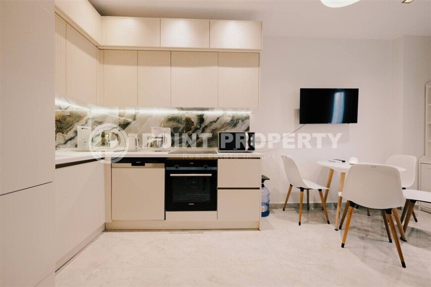 Modern apartment 50 m² in a prestigious complex near the sea, center of Alanya-id-10029-photo-3