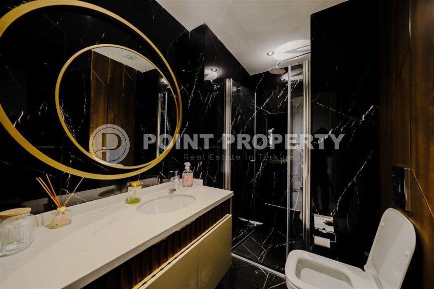 Modern apartment 50 m² in a prestigious complex near the sea, center of Alanya-id-10029-photo-10