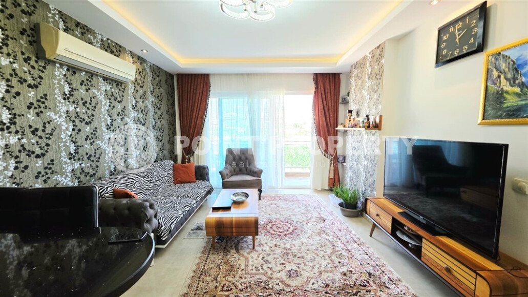 Stylish 2+1 apartment in a hotel-type complex in Mahmutlar-id-10038-photo-1