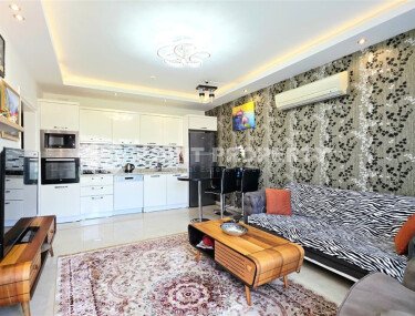 Стильная квартира 2+1 в комплексе отельного типа в Махмутларе-id-10038-фото-2