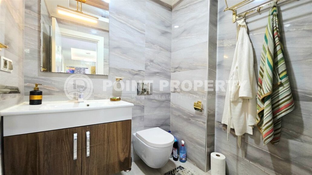 Стильная квартира 2+1 в комплексе отельного типа в Махмутларе-id-10038-фото-13