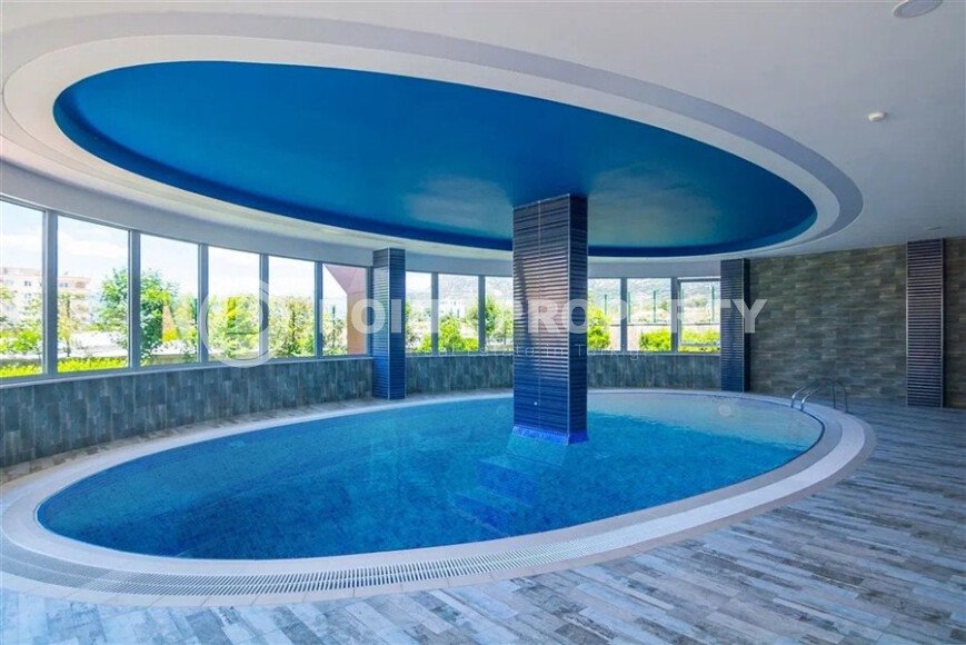 Стильная квартира 2+1 в комплексе отельного типа в Махмутларе-id-10038-фото-24