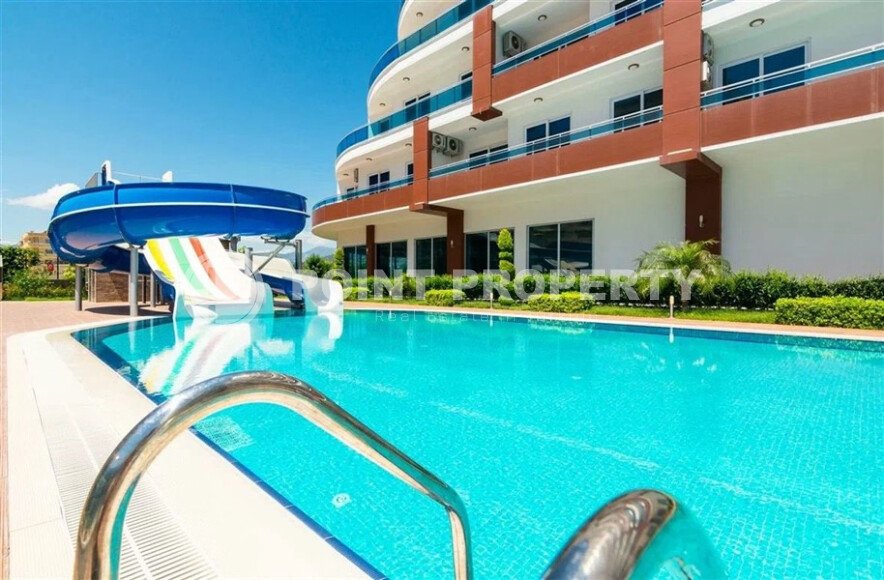 Стильная квартира 2+1 в комплексе отельного типа в Махмутларе-id-10038-фото-25