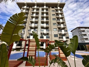 Sunny apartment 56 m² in the center of Alanya on the border with the Oba district, a complex with developed infrastructure-id-10051-photo-1