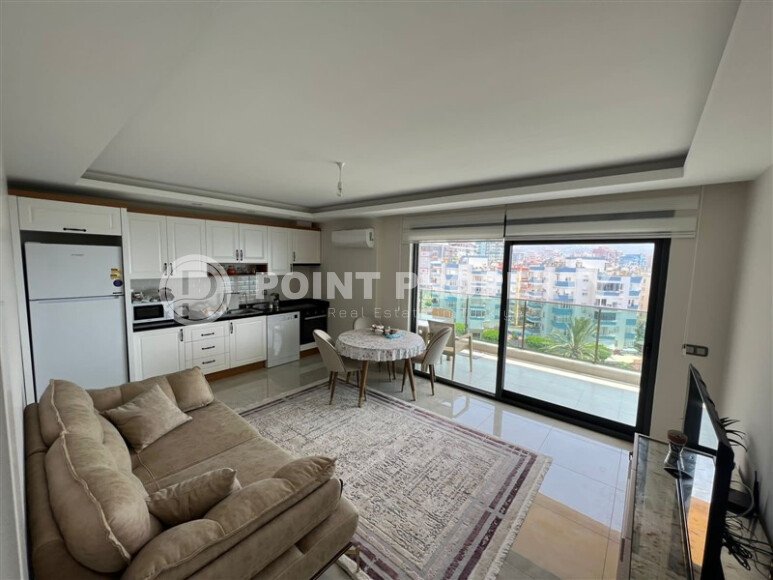 Comfortable apartment 95 m², Mahmutlar district, first line to the sea-id-10061-photo-1