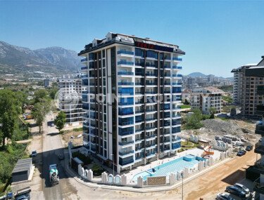 Квартира 1+1 площадью 58 м² в премиальном комплексе Махмутлара-id-10066-фото-1