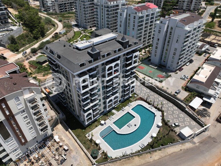 Апартаменты и двухуровневые квартиры с площадью от 56 до 115 м2 на этапе строительства в районе Авсаллар-id-3581-фото-2