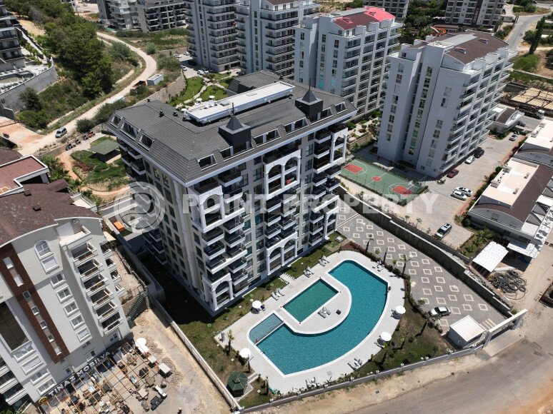 Апартаменты и двухуровневые квартиры с площадью от 56 до 115 м2 на этапе строительства в районе Авсаллар-id-3581-фото-3