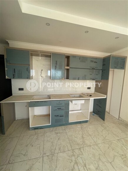 Modern apartment 1+1 55 m², Mahmutlar district in a new complex with rich infrastructure.-id-10076-photo-3