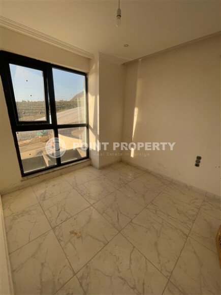 Modern apartment 1+1 55 m², Mahmutlar district in a new complex with rich infrastructure.-id-10076-photo-5