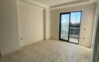 Modern apartment 1+1 55 m², Mahmutlar district in a new complex with rich infrastructure.-id-10076-photo-6