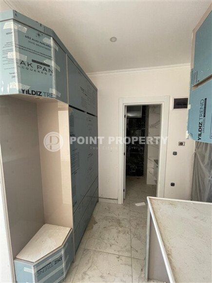Modern apartment 1+1 55 m², Mahmutlar district in a new complex with rich infrastructure.-id-10076-photo-9