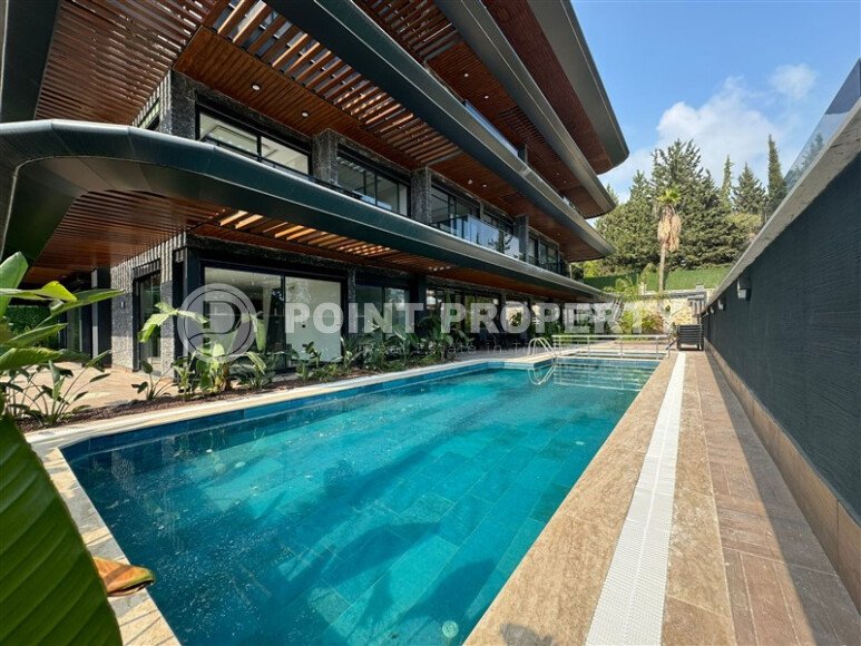 Spacious apartment 140 m² with private garden in Hasbahce area, Alanya center-id-10080-photo-1
