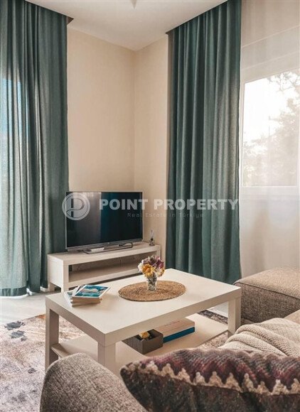 Cozy apartment 1+1, 55 m² in Mahmutlar, Alanya-id-10110-photo-1