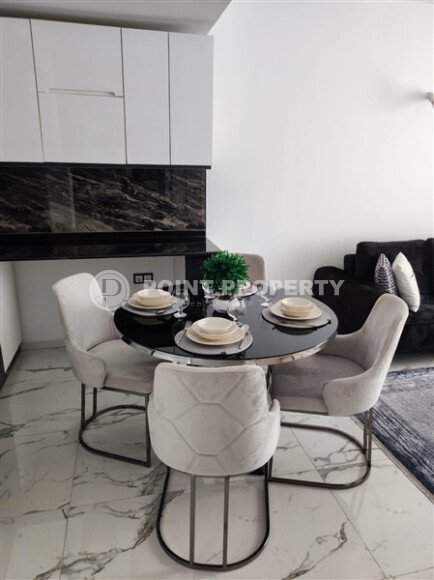 Stylish 55 m² apartment in Kestel, Alanya, with partial sea view and developed infrastructure-id-10118-photo-2