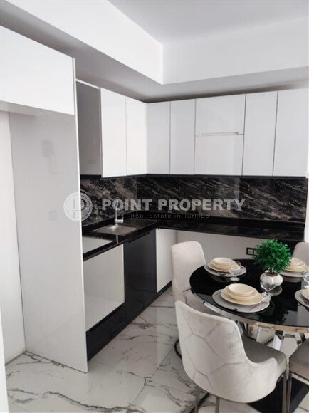 Stylish 55 m² apartment in Kestel, Alanya, with partial sea view and developed infrastructure-id-10118-photo-3