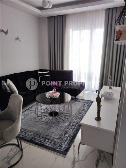 Stylish 55 m² apartment in Kestel, Alanya, with partial sea view and developed infrastructure-id-10118-photo-1
