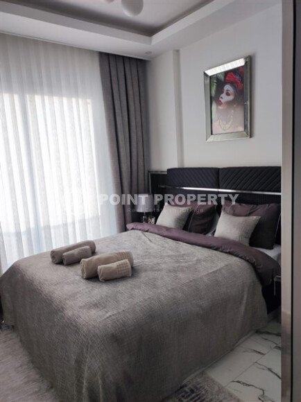 Stylish 55 m² apartment in Kestel, Alanya, with partial sea view and developed infrastructure-id-10118-photo-4