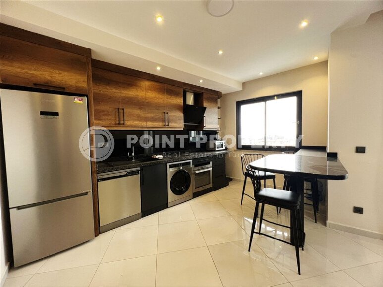 Spacious duplex 2+1, 110 m² in Mahmutlar, with mountain view and partly sea view-id-10129-photo-2