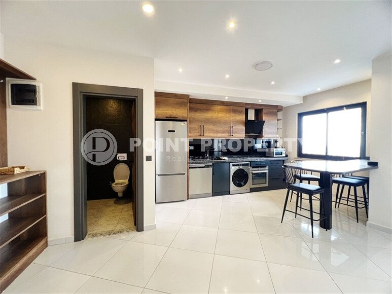 Spacious duplex 2+1, 110 m² in Mahmutlar, with mountain view and partly sea view-id-10129-photo-4