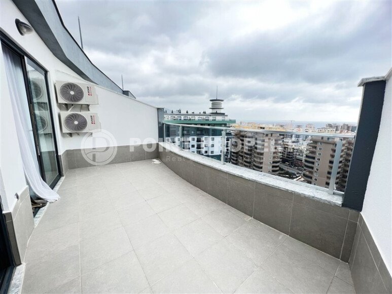 Spacious duplex 2+1, 110 m² in Mahmutlar, with mountain view and partly sea view-id-10129-photo-14