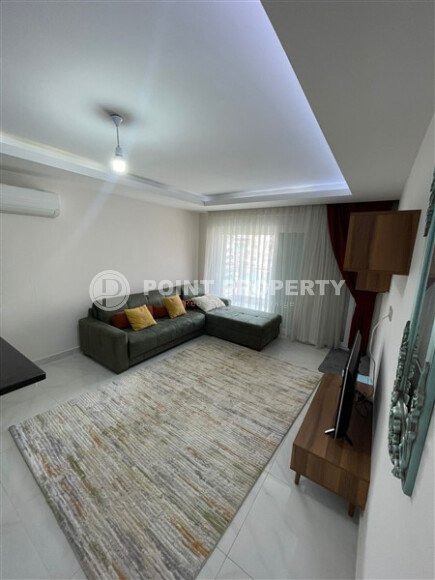 Солнечная квартира 1+1, 65 м² в районе Махмутлар, с видом на центральный проспект и частично море-id-10130-фото-2