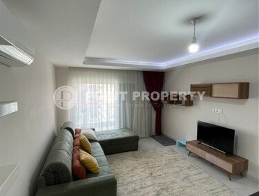 Солнечная квартира 1+1, 65 м² в районе Махмутлар, с видом на центральный проспект и частично море-id-10130-фото-4