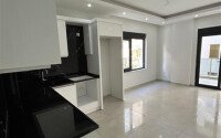 Светлая новая квартира 1+1, 50 м² в Махмутларе-id-10137-фото-4