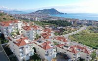 Apartment 2+1, 110 m² in the center of Alanya with a view of Cleopatra Beach and a residence permit-id-10143-photo-2