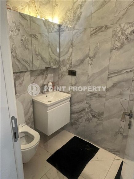 Современный дуплекс 2+1, 110 м² в районе пляжа Клеопатры с частичным видом на море-id-10147-фото-7