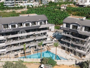 Линейные и двухуровневые квартиры в жилом комплексе на завершающем этапе строительства, в 1800 метрах от  моря-id-7406-фото-1