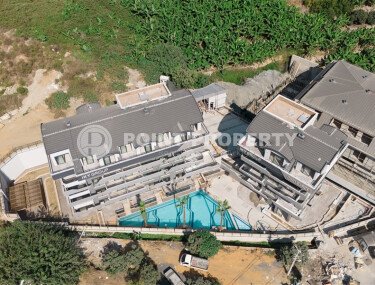 Линейные и двухуровневые квартиры в жилом комплексе на завершающем этапе строительства, в 1800 метрах от  моря-id-7406-фото-2