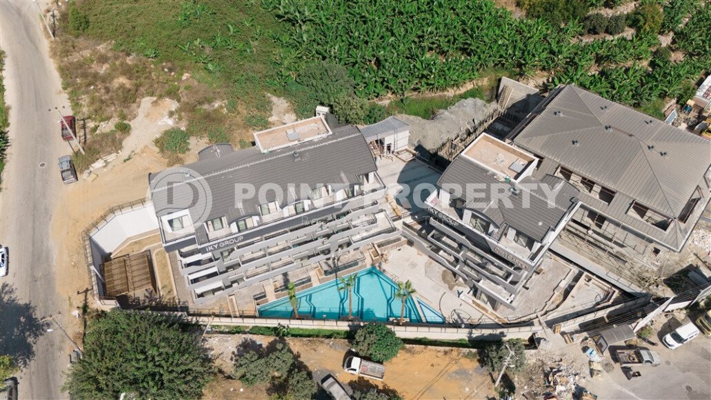 Линейные и двухуровневые квартиры в жилом комплексе на завершающем этапе строительства, в 1800 метрах от  моря-id-7406-фото-2