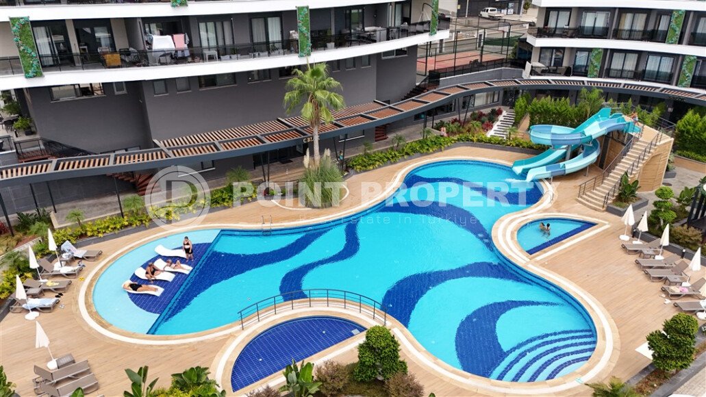 Новые квартиры в элитном жилом комплексе, с возможностью получения гражданства Турции-id-7386-фото-1