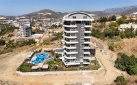Новый инвестиционный проект - современный жилой комплекс, с развитой внутренней инфраструктурой, в спокойном районе Аланьи - Демирташ-id-5749-фото-8