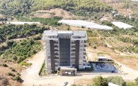 Новый инвестиционный проект - современный жилой комплекс, с развитой внутренней инфраструктурой, в спокойном районе Аланьи - Демирташ-id-5749-фото-12