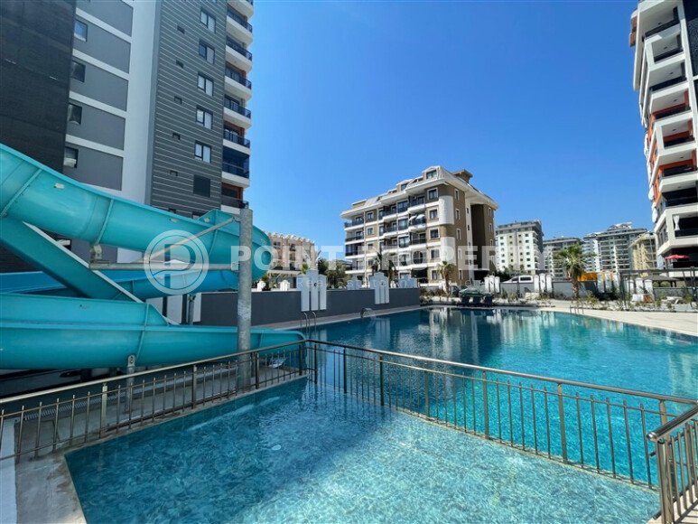 New 1+1 apartment, 49 m² in Mahmutlar near the sea-id-10177-photo-1