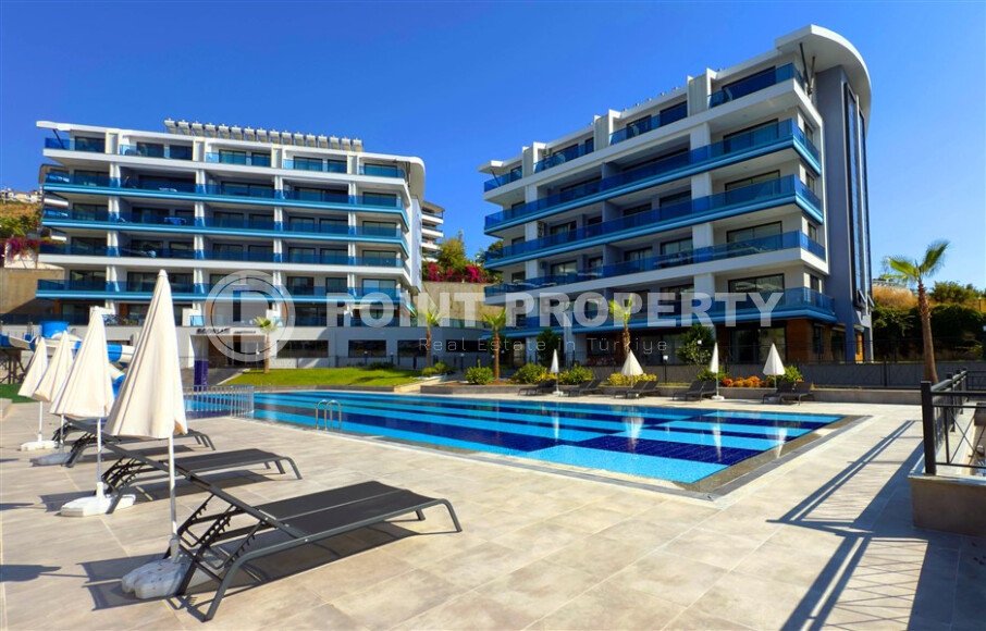Garden duplex 2+1, 130 m² in Kargicak with a spacious terrace and infrastructure-id-10183-photo-1