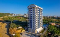 Старт продаж просторных квартир 1+1 и 2+1 дуплексов в центре Махмутлара, от 54 до 140 м2.-id-1874-фото-3