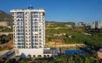 Старт продаж просторных квартир 1+1 и 2+1 дуплексов в центре Махмутлара, от 54 до 140 м2.-id-1874-фото-5