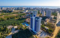 Старт продаж просторных квартир 1+1 и 2+1 дуплексов в центре Махмутлара, от 54 до 140 м2.-id-1874-фото-7