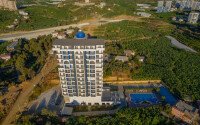 Старт продаж просторных квартир 1+1 и 2+1 дуплексов в центре Махмутлара, от 54 до 140 м2.-id-1874-фото-11