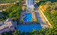 Старт продаж просторных квартир 1+1 и 2+1 дуплексов в центре Махмутлара, от 54 до 140 м2.-id-1874-фото-27