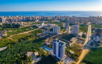 Старт продаж просторных квартир 1+1 и 2+1 дуплексов в центре Махмутлара, от 54 до 140 м2.-id-1874-фото-31
