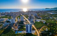Старт продаж просторных квартир 1+1 и 2+1 дуплексов в центре Махмутлара, от 54 до 140 м2.-id-1874-фото-34