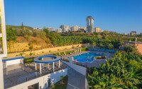 Старт продаж просторных квартир 1+1 и 2+1 дуплексов в центре Махмутлара, от 54 до 140 м2.-id-1874-фото-35
