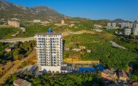Старт продаж просторных квартир 1+1 и 2+1 дуплексов в центре Махмутлара, от 54 до 140 м2.-id-1874-фото-39