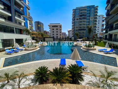 Bright 1+1 apartment, 65 m² in Mahmutlar in a complex with rich infrastructure-id-10193-photo-1