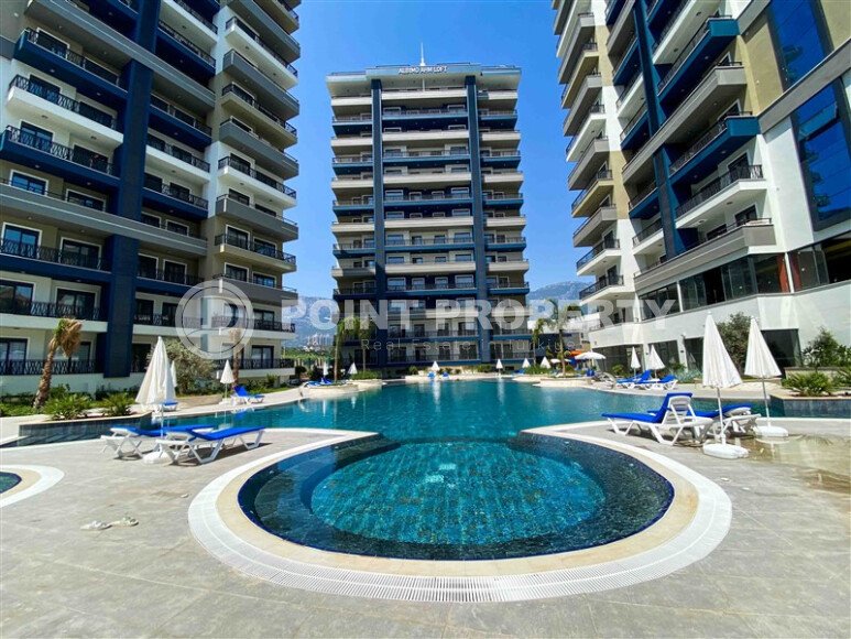 Светлая квартира 1+1, 65 м² в Махмутларе в комплексе с богатой инфраструктурой-id-10193-фото-2